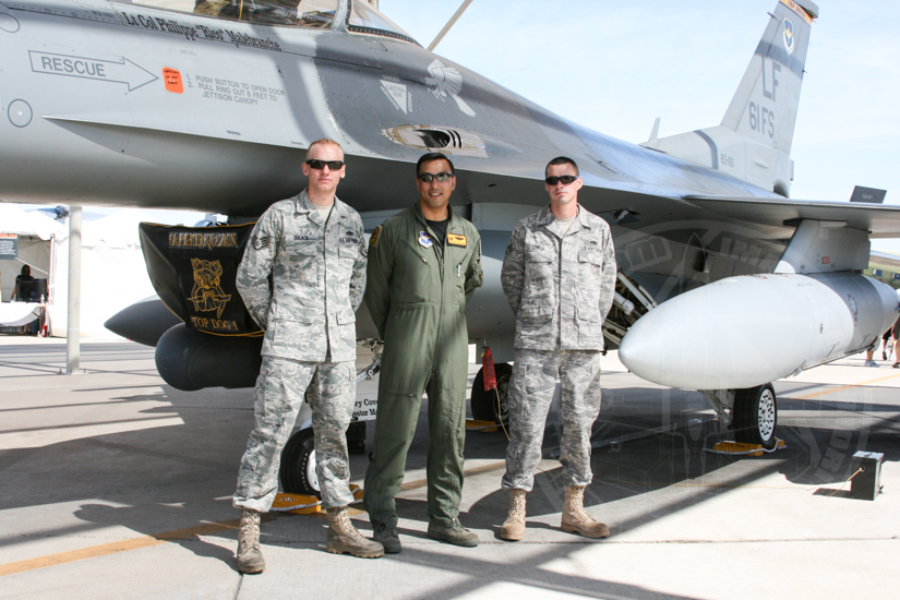 Luke pilot and airmen stand with 61st Fighter Sqn F-16