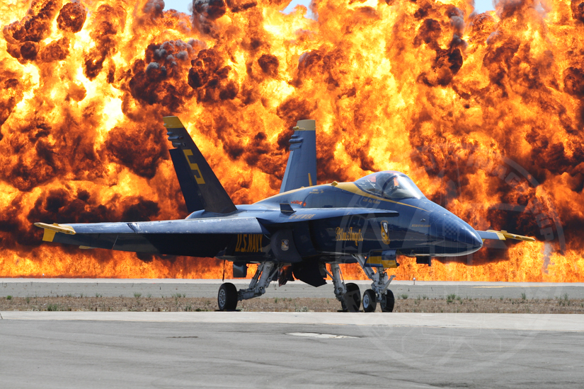 Blue Angels Number 5 Sits Idle Before a Wall of Fire at MCAS Miramar