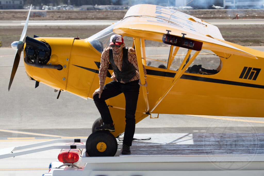Stunt Pilot Eric Tucker with his Piper J3 Cub