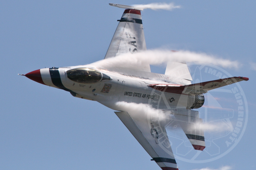 Thunderbird F-16 with Vapor Ripping over the Airplane
