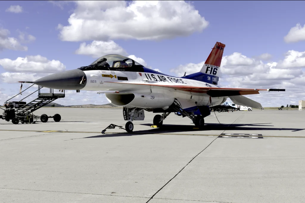 U.S. Air Force F-16C Viper Demonstration Team aircraft in its iconic red, white, and blue heritage paint scheme inspired by the original YF-16 prototype.