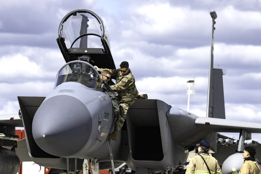 U.S. Air Force ground crew assist an F-15C Eagle pilot during preflight preparations at the Fairchild SkyFest airshow in June 2026.