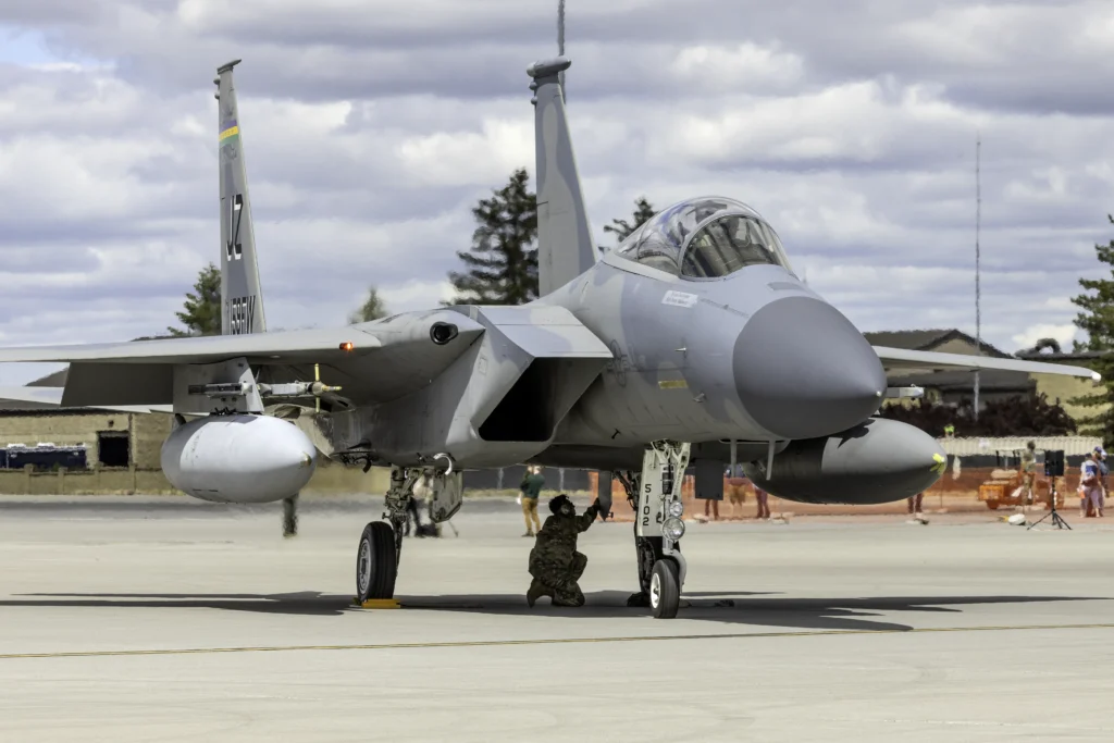 U.S. Air Force F-15C Eagle undergoes pre-flight checks in the hot pit area before the flight demonstration at the Fairchild AFB SkyFest Air Show.